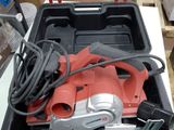 a tool box with tools in it sitting on a table