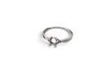 an image of a silver ring on a white background