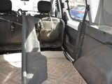 a car that has a guitar in the back of it