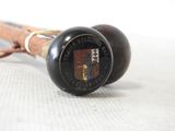 a close up of a stick with a coat of arms on it