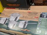 a box of pots and pans that are on the table