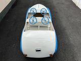 a small toy car that is sitting on the ground