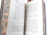 an open book that is sitting on top of a table