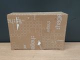 a cardboard box with a picture on it sitting on a table