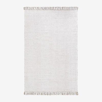 a white rug with fringes on a white background