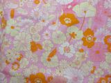 an image of a pink and yellow floral print fabric