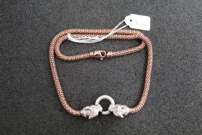 bracelet plaqué argent et or rose, muni d'une chaîne et d'un fermoir