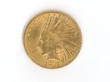 an image of a gold coin on a white surface