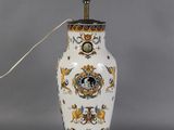an image of a vase with a lamp attached to it