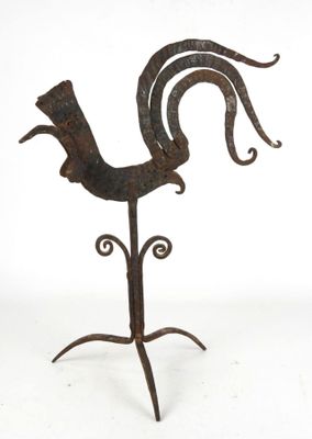 wrought iron rooster on a stand on a white background