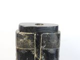 a black and white vase with a black and white design on it