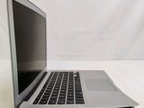 a laptop that is sitting on a white table