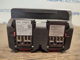 the two batteries are connected to each other on the table