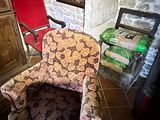a chair that is sitting in the corner of a room