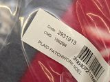 a close up of a red tie with a barcode on it