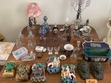 a wooden table with a lot of items on it