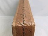 a cardboard box with writing on it sitting on a table