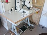 a sewing machine sitting on a table in a room