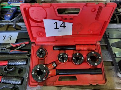 an image of a red tool box with tools in it