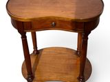 an image of a wooden table with a drawer underneath it