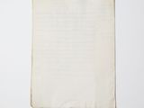 an old piece of paper on a white surface