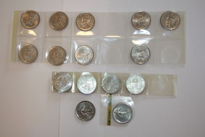 a lot of coins that are sitting on a table