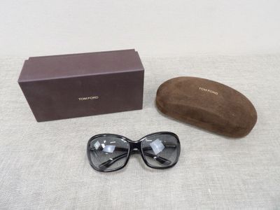 chanel sunglasses with box and case on a white surface