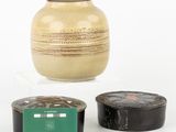 three different types of vases sitting next to each other