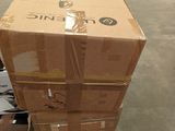 boxes stacked on top of each other in a warehouse