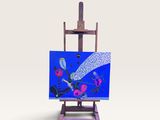 chevalet d'artiste avec une peinture représentant un oiseau sur fond bleu