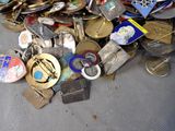 a pile of old and new badges on the floor