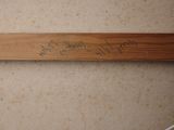 a picture of a baseball bat with writing on it