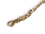 an image of a close up of a gold bracelet on a white background