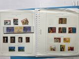 a lot of stamps on the pages of a book