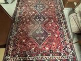 a large rug on the floor in a room