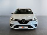 the front view of a white car in a showroom
