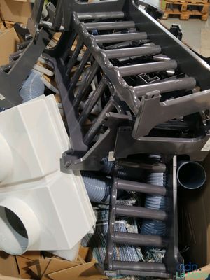 a pile of assorted items sitting in a box