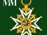 an image of a gold and white medal with a green background