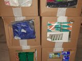 two boxes that have toothbrushes and toothpaste in them