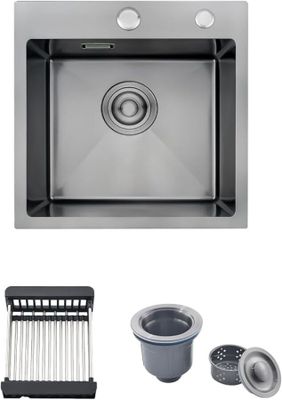 a close up of a kitchen sink with a strainer and strainer