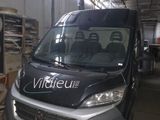 a van that is parked inside of a building