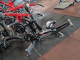 many bikes that are sitting on the floor in the gym