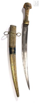 pair of old and worn knifes on a white surface with a keychain