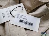 a label on a pair of pants with a barcode on it