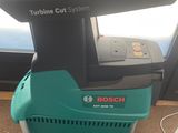a machine that is sitting on the floor in front of a window