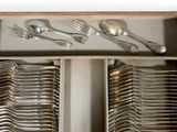 silverware in a drawer with spoons, forks, and spoons in it