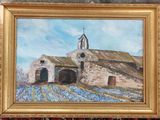 a painting of a church in the middle of a field