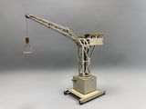 a toy crane that is sitting on top of a table