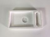 an image of a close up of a plastic object on a white surface