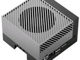 un gros plan d'un ordinateur surmonté d'un ventilateur